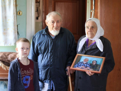 Юный фотограф Вова Гулюкин, Дмитрий Семёнович и Анна Михайловна Оськины